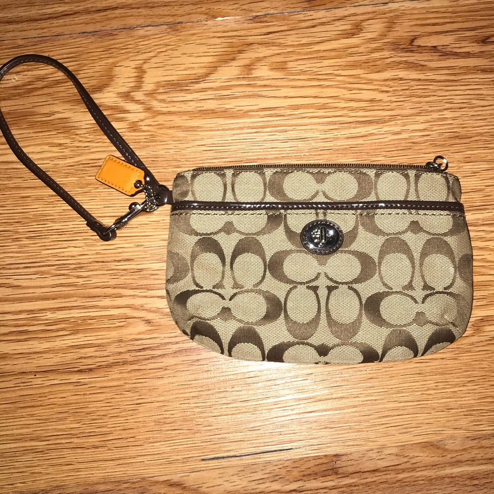 Brown and tan canvas original Coach wristlet bag